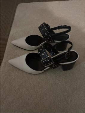 Charles & Keith White Pointed Slingback Heels with Black Studded Straps